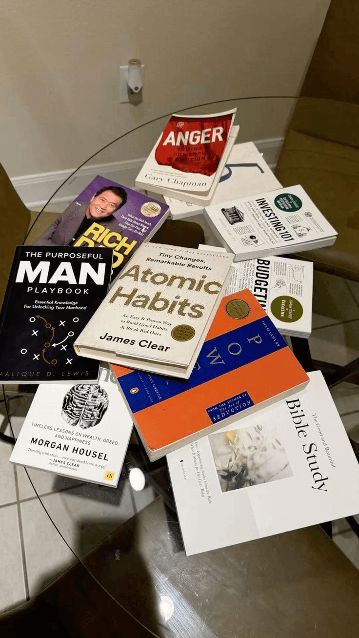 Collection of published books including Atomic Habits, Rich Dad Poor Dad, and The 48 Laws of Power