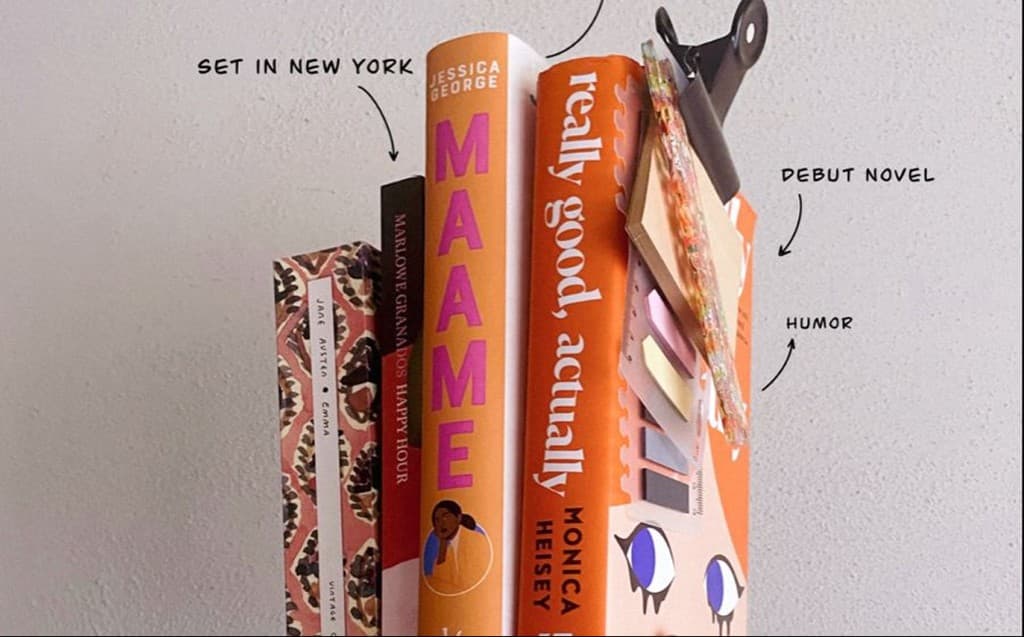 Colorful stack of book spines representing diverse published titles